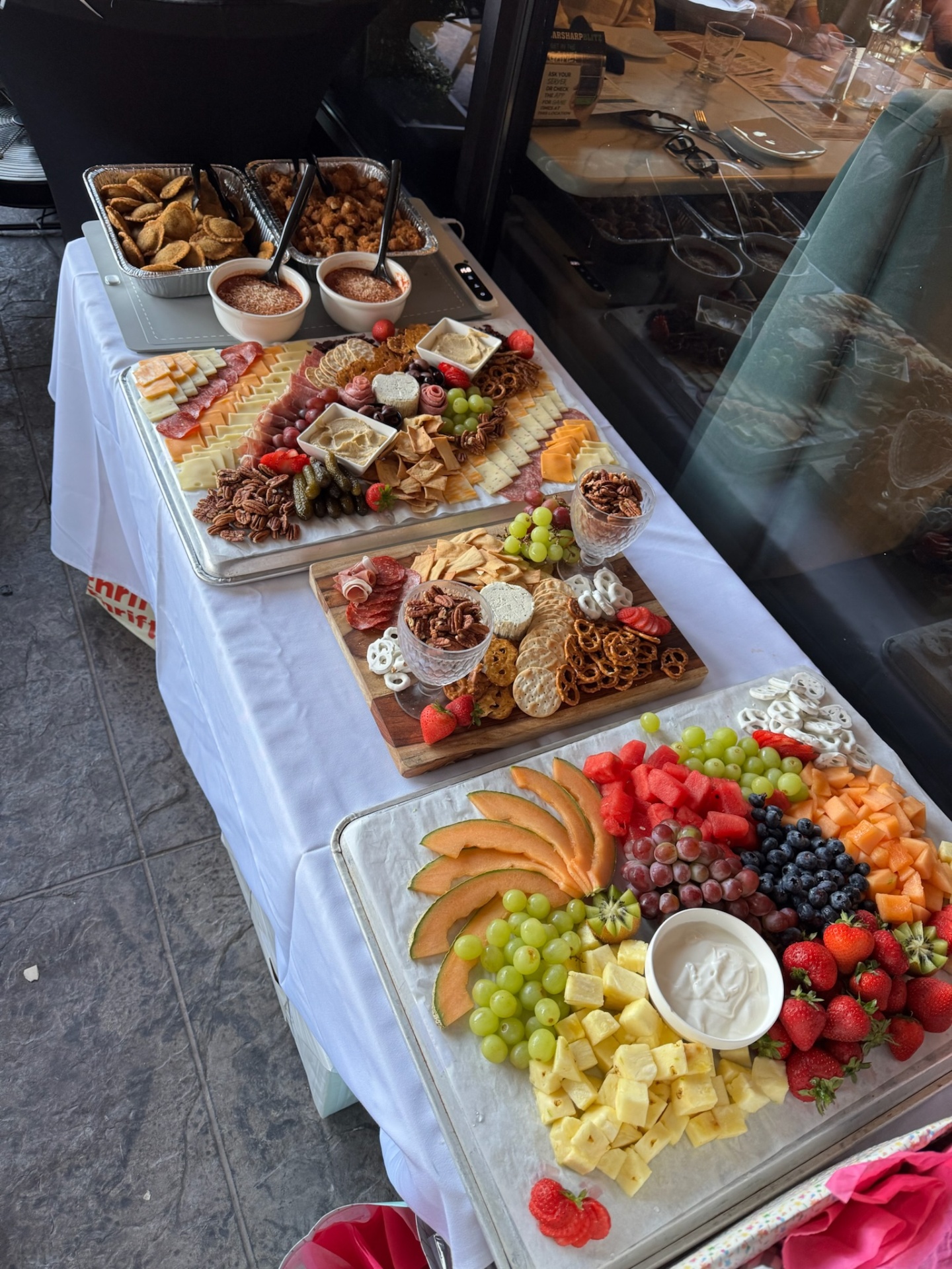 Three board catering display with toasted ravioli